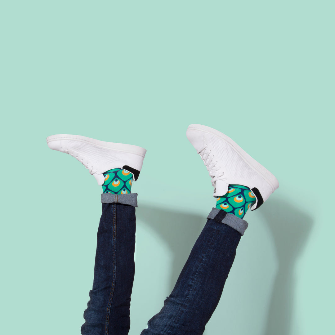  Peacock socks | Nature-inspired design | Vibrant patterns | Eye-catching colors | Sock subscription | Fashion statement | Natural beauty