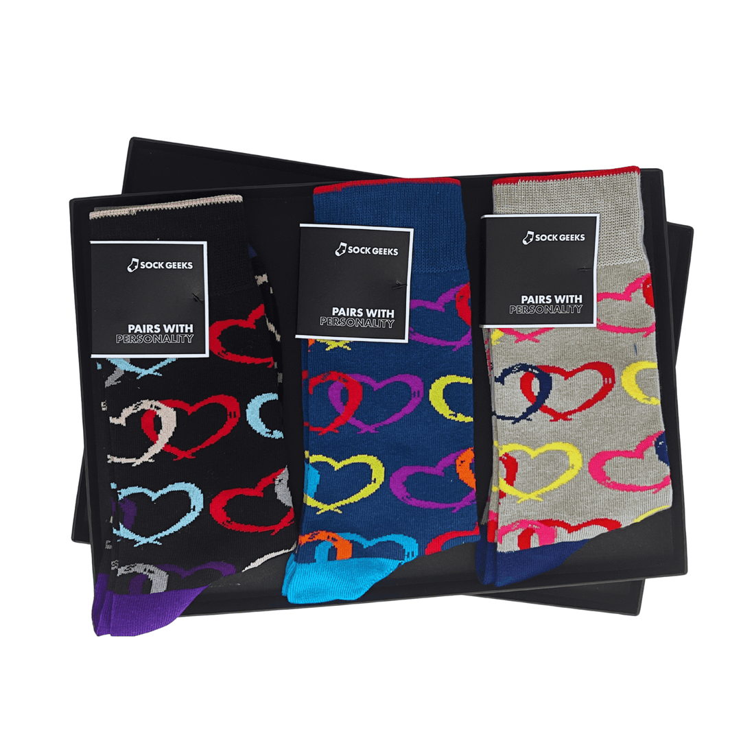 heart patterns | black gift box | vibrant socks | playful design | breathable cotton | comfortable socks