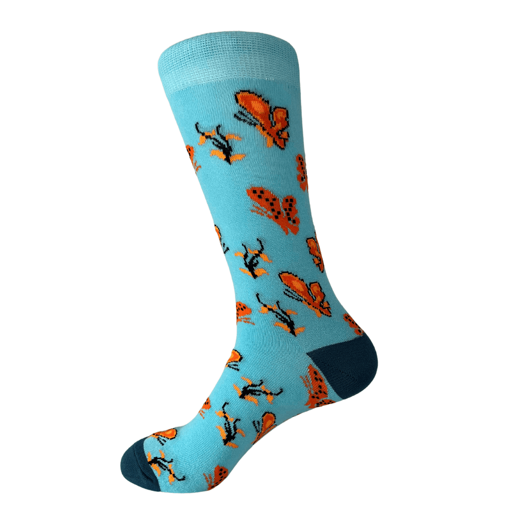 blue socks | orange butterflies | organic cotton | UK made socks | nature-inspired design | stylish comfort | butterfly pattern